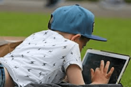 Children playing brain-training games for ADHD support